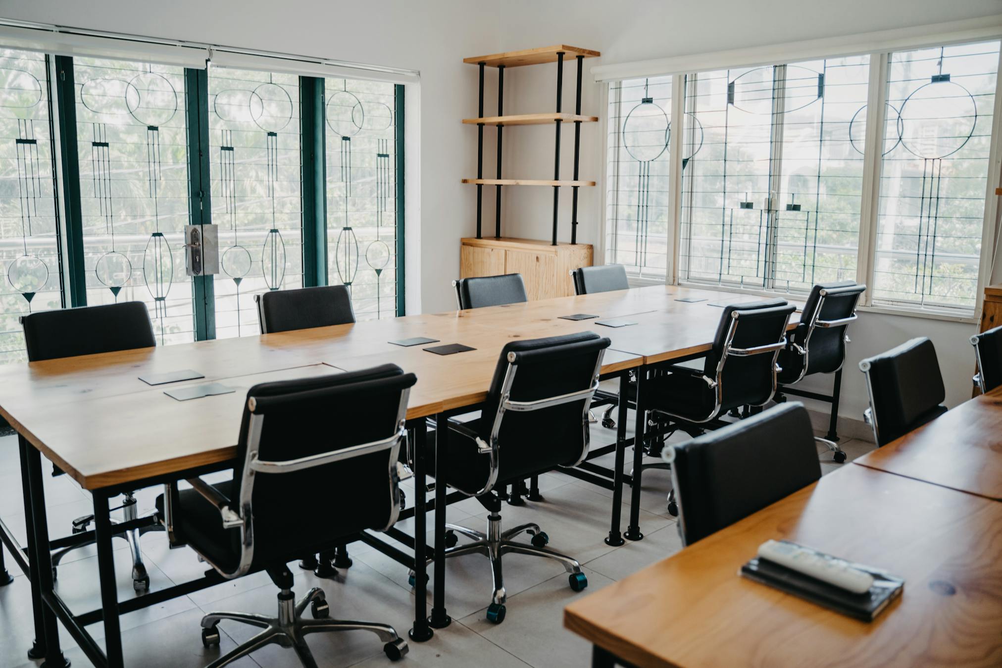 Black Chairs and Brown Wooden Tables